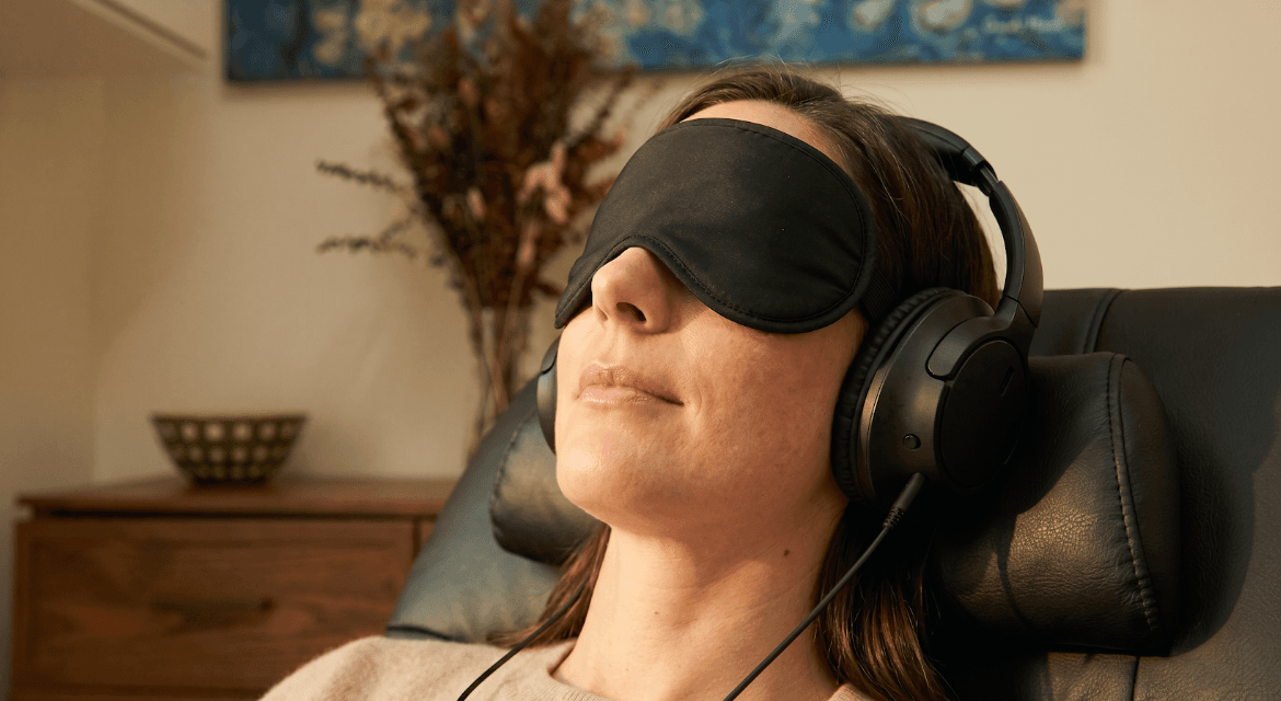 A patient resting comfortably during a monitored session
